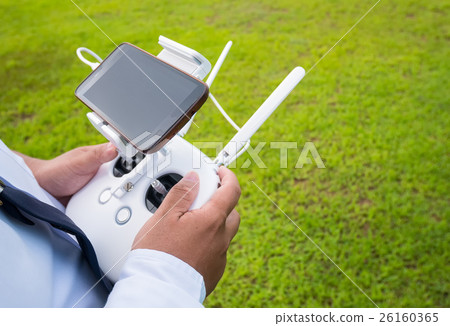 Hand holding on remote for Control drone 26160365