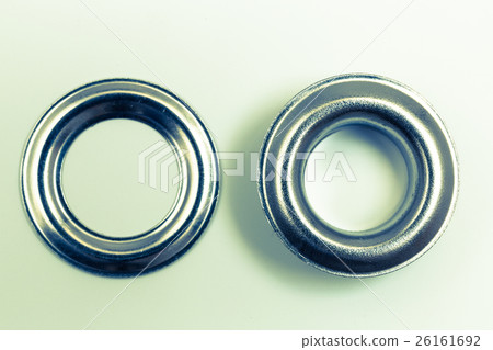 Hole rivets on a light background retro optics 26161692