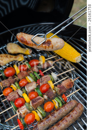 Assorted delicious grilled meat with vegetable on 26161758
