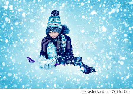 Boy in knitted hat, gloves and scarf outdoors at Boy in knitted hat, gloves and scarf outdoors at 26161934