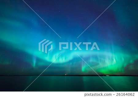 Northern lights over lake in finland Northern lights over lake in finland 26164062