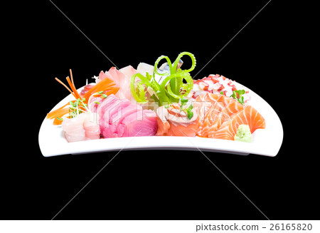 Mixed sashimi in white plate on black with path 26165820