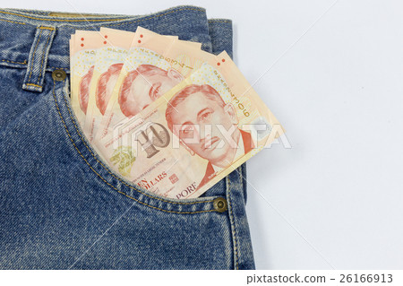 Close up Singapore dollars in a jeans pocket  26166913