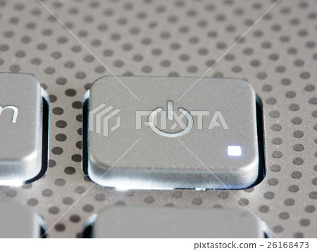 Silver power button close-up 26168473