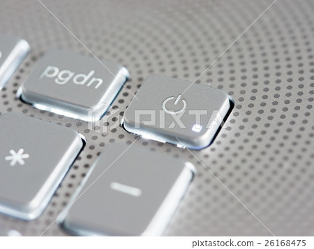 Silver power button close-up 26168475