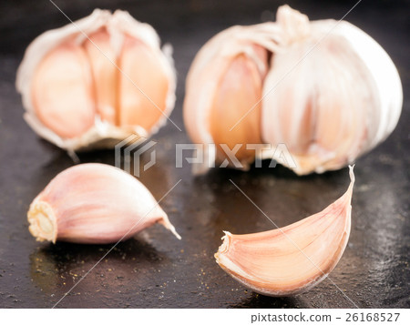 garlic on black background 26168527