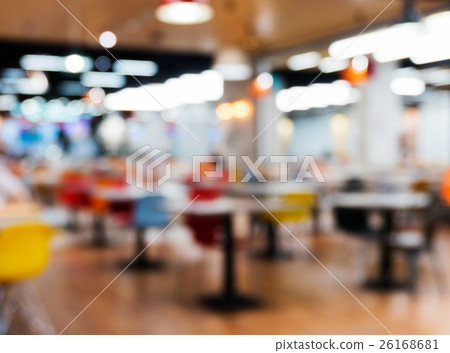 Blurred silhouettes of people sitting in a cafe. Blurred silhouettes of people sitting in a cafe. 26168681
