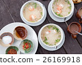 Thai rice soup with Seasoning on wood table 26169918
