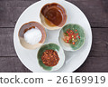four food seasoning in ceramic bowl on wood table 26169919