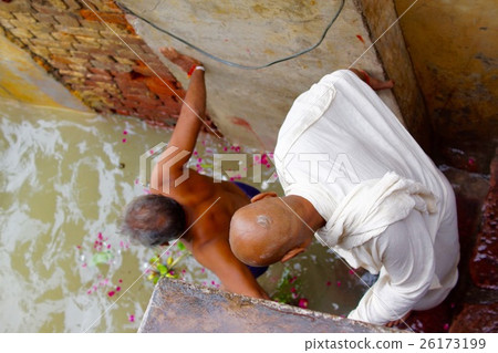 Prayagraj, India Indians bathing in the Ganges 26173199