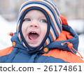 Attractive baby boy playing with the first snow 26174861