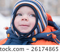 Attractive baby boy playing with the first snow 26174865