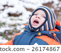 Attractive baby boy playing with the first snow 26174867