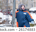 Attractive baby boy playing with the first snow 26174883