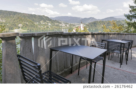 outdoor cafe tables with above view over lake Bled 26176462