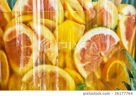 Sliced orange in juice, tasty refreshment 26177764