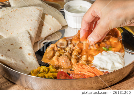 Typical Indian curry and chapati chapati and curry lunch Typical Indian curry and chapati chapati and curry lunch 26181260