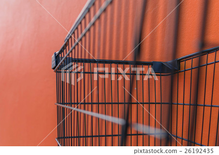 Minimalism style, Shopping cart and orange wall. 26192435