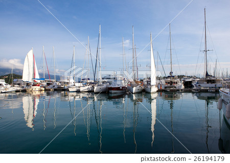 yachts at marina in Greece, reflected in the water 26194179