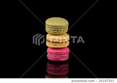 Colorful macaroon over black background Colorful macaroon over black background 26197501