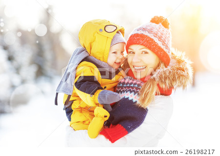 happy family mother and baby is happy snow on winter walk happy family mother and baby is happy snow on winter walk 26198217