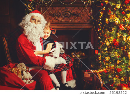 happy child girl hugging Santa happy child girl hugging Santa 26198222
