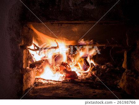 Flame closeup in the fireplace Flame closeup in the fireplace 26198766