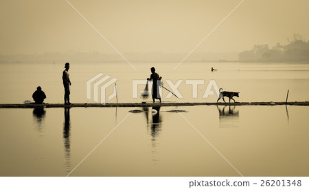People catching fish on lake People catching fish on lake 26201348