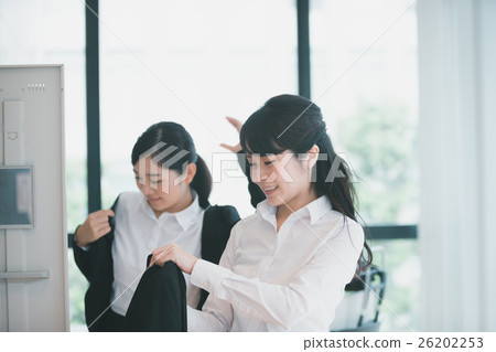 changing room, locker room, getting dressed 26202253