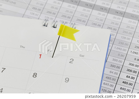 Yellow Pins to Wildcats on the calendar beside the number red color of one. 26207959