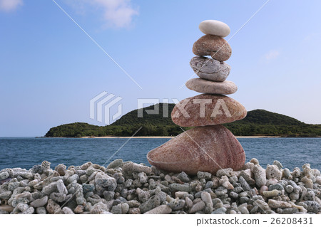 Balance stone on pile rock of sea background. 26208431
