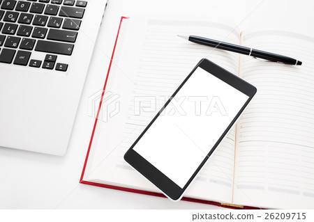 Smartphone with blank screen on office stuff 26209715