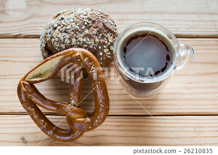 Bread and cup of coffee. Bread and cup of coffee. 26210835