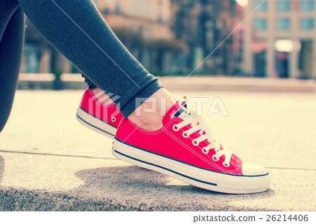 Legs of a girl in a summer town 26214406