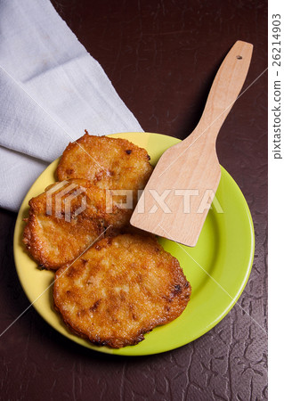 Potato pancakes with meat on green plate Potato pancakes with meat on green plate 26214903