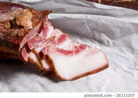 Puff smoked bacon on the packaging paper.  26215207