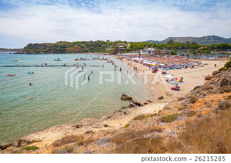 Tourists relax on the beach. Zakynthos, Greece Tourists relax on the beach. Zakynthos, Greece 26215285