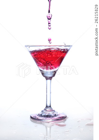 Red wine splash and flying out of the glass Red wine splash and flying out of the glass 26215829