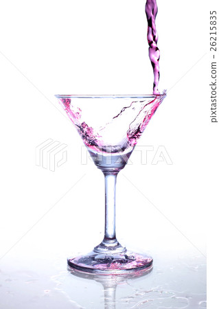Red wine splash and flying out of the glass Red wine splash and flying out of the glass 26215835