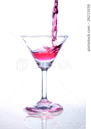 Red wine splash and flying out of the glass Red wine splash and flying out of the glass 26215836