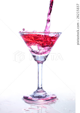 Red wine splash and flying out of the glass Red wine splash and flying out of the glass 26215837