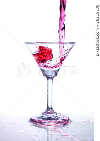 Red wine splash and flying out of the glass Red wine splash and flying out of the glass 26215839