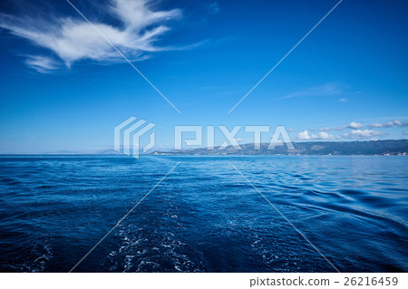 Photo of Blue Sea and Tropical Sky Clouds. Photo of Blue Sea and Tropical Sky Clouds. 26216459
