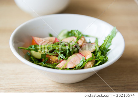 Hot meat salad with fresh radish in white plate Hot meat salad with fresh radish in white plate 26216574