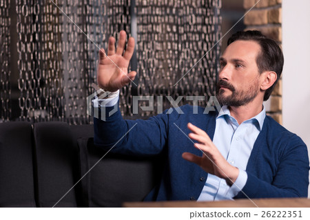 Thoughtful nice man being in the virtual reality Thoughtful nice man being in the virtual reality 26222351