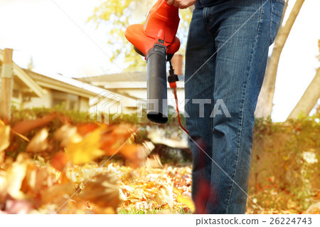 Man working with leaf blower Man working with leaf blower 26224743