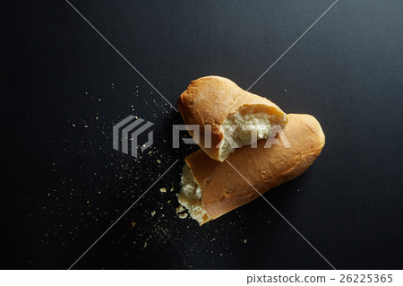 Fresh baked bread loaf broken Fresh baked bread loaf broken 26225365