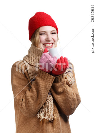 Smiling woman in winter clothing with cup Smiling woman in winter clothing with cup 26225652