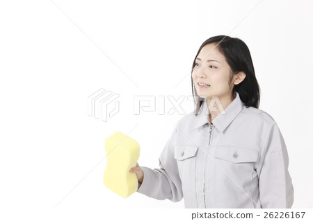 A young lady with a car wash sponge A young lady with a car wash sponge 26226167