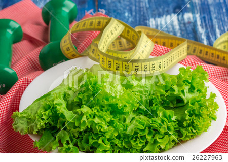 Fitness composition of lettuce, weights and ruler 26227963